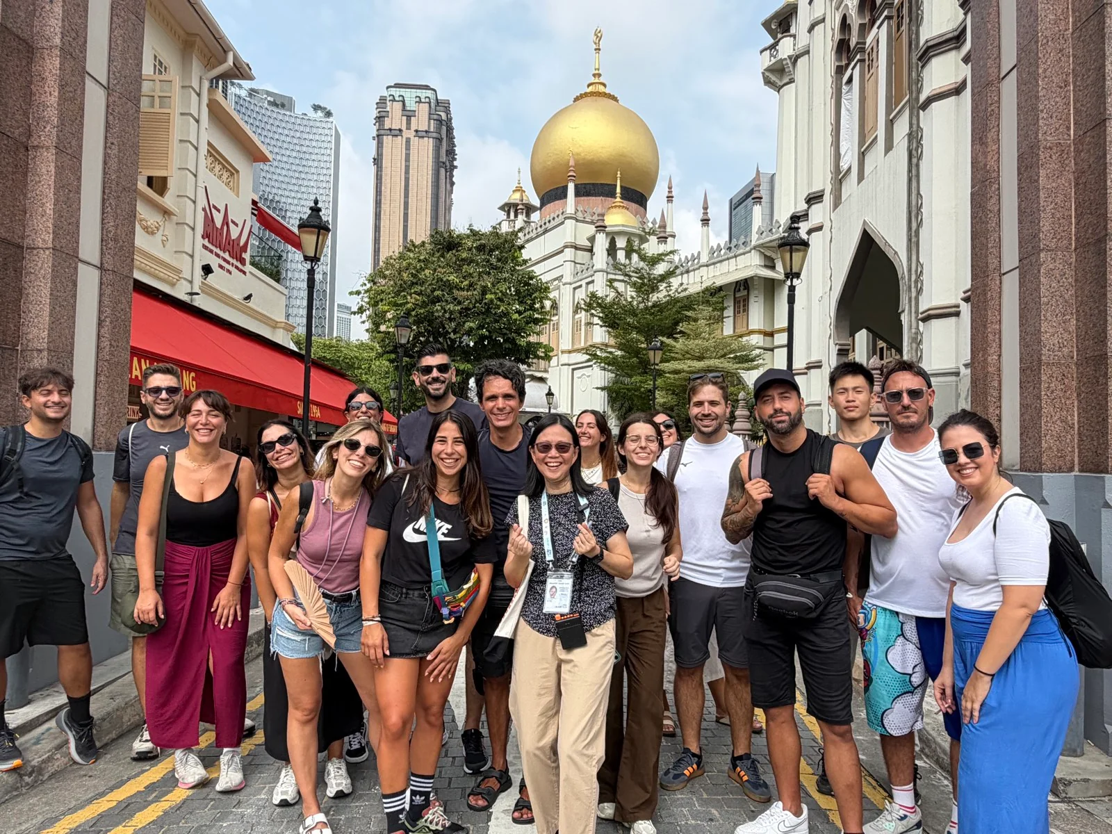 A female tourist guide with a walking tour group in Kampong Gelam